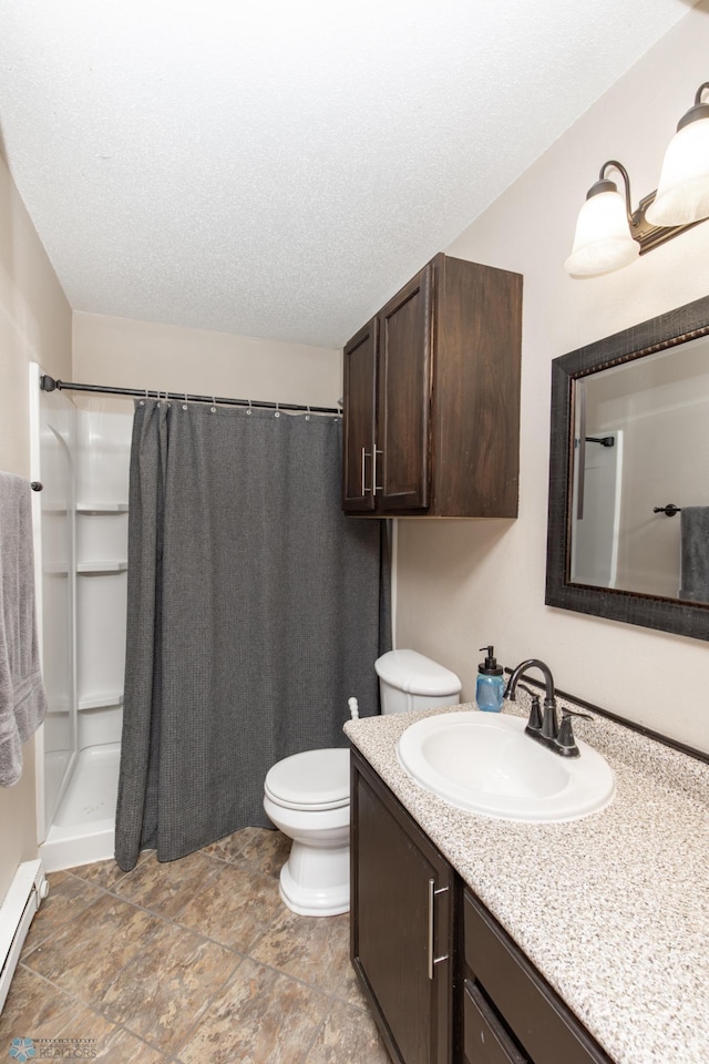 full bath featuring a baseboard radiator, a shower with curtain, toilet, vanity, and a textured ceiling