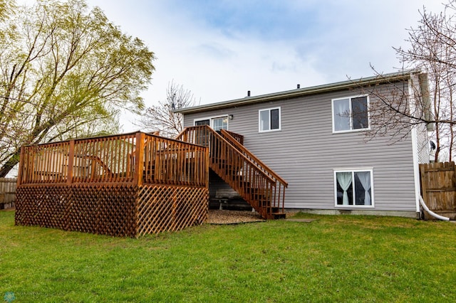 back of property featuring a deck and stairway