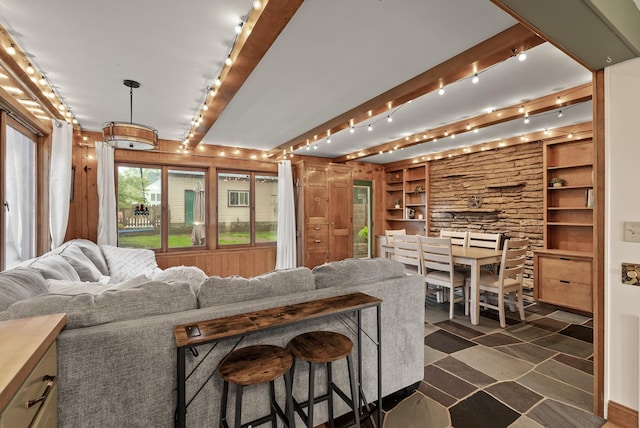 4236 Salem Ave, Saint Louis Park, MN 55416 - living area with rail lighting, beam ceiling, and built in shelves