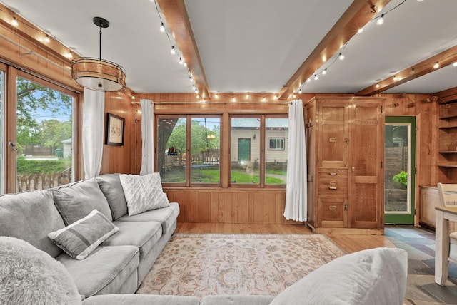 4236 Salem Ave, Saint Louis Park, MN 55416 - living room featuring beam ceiling, rail lighting, wood walls, and light wood finished floors