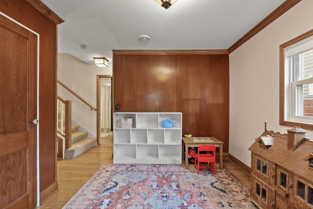 4236 Salem Ave, Saint Louis Park, MN 55416 - recreation room featuring light wood finished floors, baseboards, and crown molding