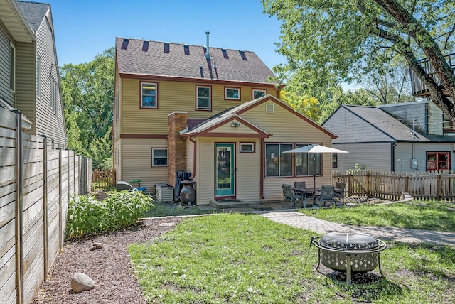 4236 Salem Ave, Saint Louis Park, MN 55416 - back of house featuring a fire pit, entry steps, and a patio