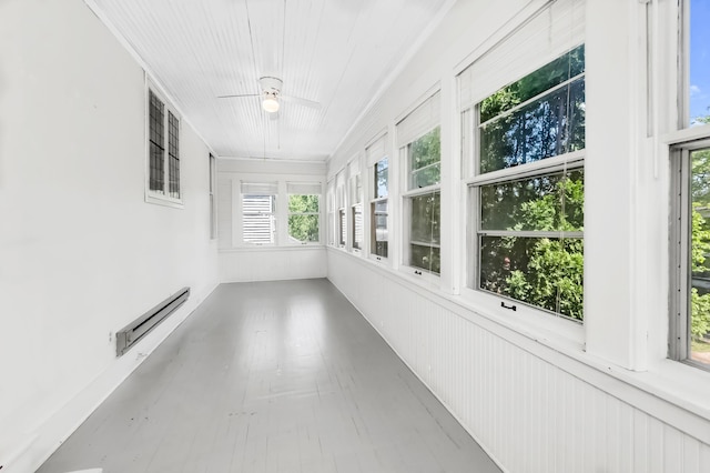 4304 Colfax Ave S, Minneapolis, MN 55409 - unfurnished sunroom with a baseboard radiator and a ceiling fan
