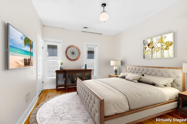 4304 Colfax Ave S, Minneapolis, MN 55409 - bedroom with light wood finished floors and baseboards
