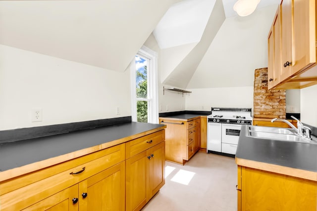 4304 Colfax Ave S, Minneapolis, MN 55409 - kitchen with white gas range oven, a sink, vaulted ceiling, and dark countertops