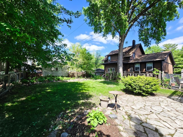 4304 Colfax Ave S, Minneapolis, MN 55409 - view of yard with a patio area