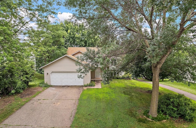 9013 91st St S, Cottage Grove, MN 55016 - view of front facade with driveway, a garage, and a front yard