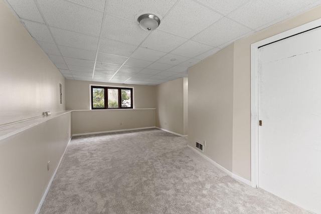 9013 91st St S, Cottage Grove, MN 55016 - carpeted empty room featuring a drop ceiling and baseboards
