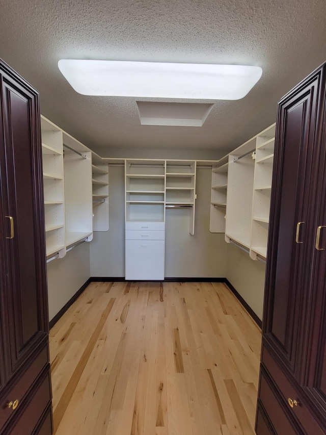1605 26th St SE, Saint Cloud, MN 56304 - spacious closet with light wood finished floors