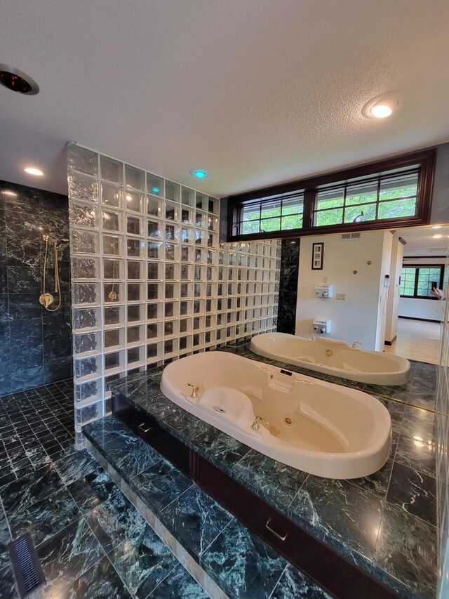 1605 26th St SE, Saint Cloud, MN 56304 - bathroom featuring a walk in shower, a whirlpool tub, recessed lighting, and marble finish flooring