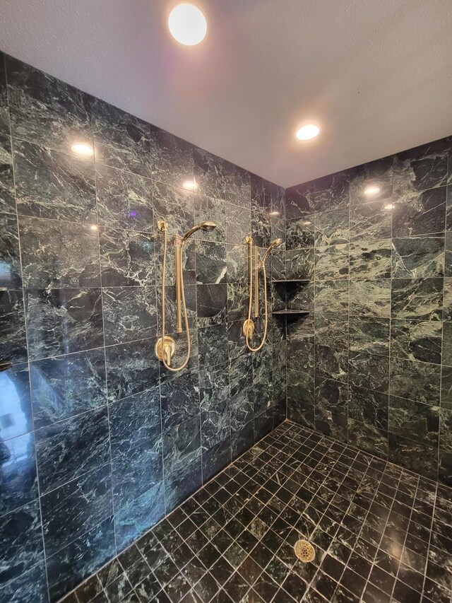 1605 26th St SE, Saint Cloud, MN 56304 - full bathroom featuring tiled shower and marble look tile flooring