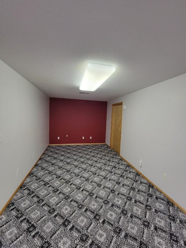 1605 26th St SE, Saint Cloud, MN 56304 - spare room with carpet and baseboards