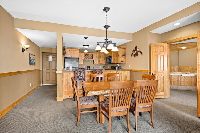 14125-307A Burlington Rd, Two Harbors, MN 55616 - carpeted dining space with baseboards