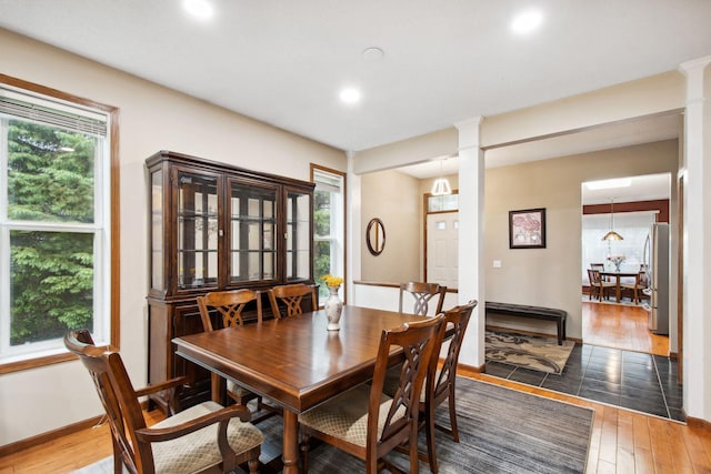 14650 Bloomfield Path, Rosemount, MN 55068 - dining space featuring hardwood / wood-style floors, plenty of natural light, baseboards, and recessed lighting
