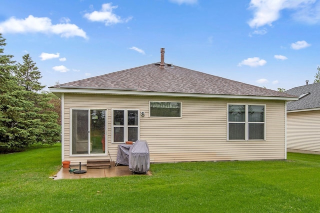 14650 Bloomfield Path, Rosemount, MN 55068 - back of house featuring roof with shingles, a yard, and entry steps