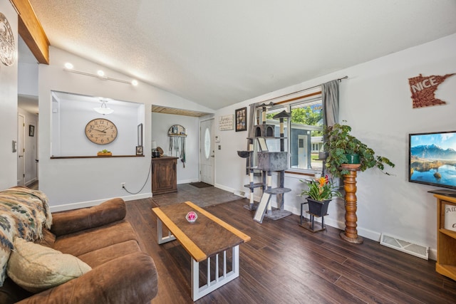603 2nd Ave NW, Buffalo, MN 55313 - living area with vaulted ceiling, wood finished floors, and baseboards