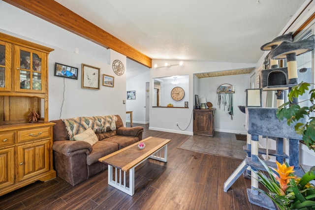 603 2nd Ave NW, Buffalo, MN 55313 - living area featuring dark wood-style flooring, a textured ceiling, and baseboards