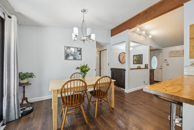 603 2nd Ave NW, Buffalo, MN 55313 - dining room with dark wood-style flooring, baseboards, and a chandelier