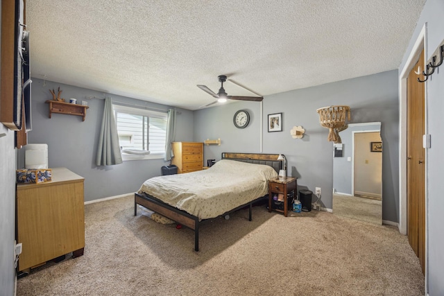 603 2nd Ave NW, Buffalo, MN 55313 - carpeted bedroom featuring ceiling fan, a textured ceiling, and baseboards