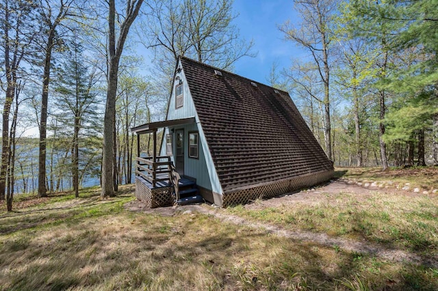 35253 Johnson Lake Rd, Deer River, MN 56636 - view of home's exterior with a shingled roof