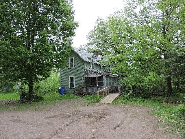 16166 Par Cir SW, Pine City Twp, MN 55063 - view of side of home featuring a sunroom and a chimney