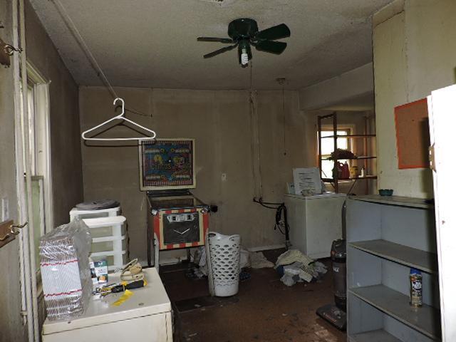 16166 Par Cir SW, Pine City Twp, MN 55063 - miscellaneous room featuring a ceiling fan and washer / dryer