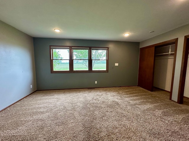 210 160th Ave, Osborne Twp, MN 56128 - unfurnished bedroom featuring carpet flooring and recessed lighting