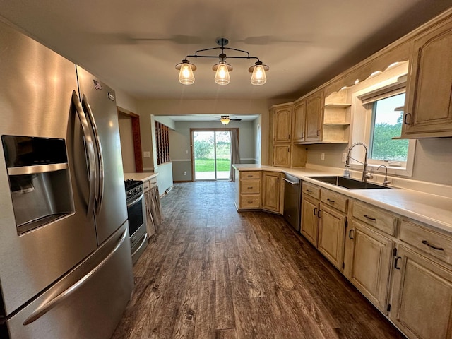 210 160th Ave, Osborne Twp, MN 56128 - kitchen featuring appliances with stainless steel finishes, a sink, dark wood-style flooring, and light countertops