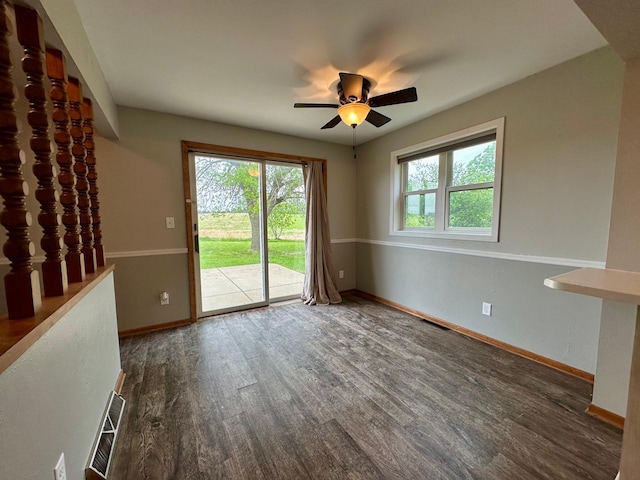 210 160th Ave, Osborne Twp, MN 56128 - empty room featuring wood finished floors, a ceiling fan, and baseboards