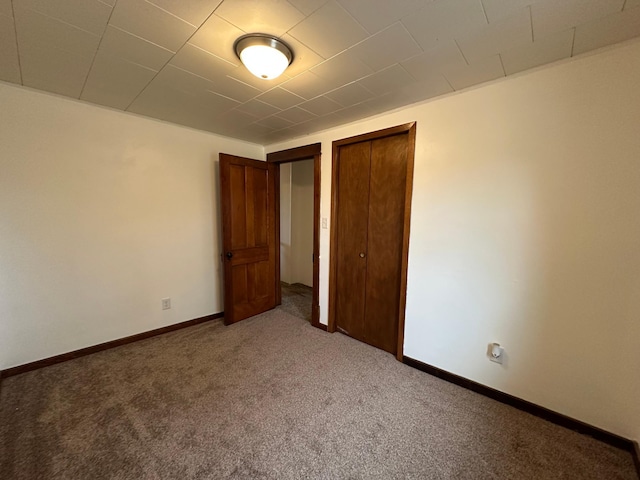 210 160th Ave, Osborne Twp, MN 56128 - unfurnished bedroom with carpet floors and baseboards