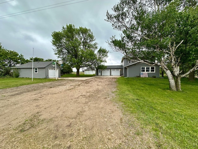 210 160th Ave, Osborne Twp, MN 56128 - view of front facade with driveway and a front lawn