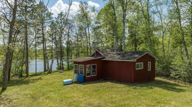 16504 280th St, Park Rapids, MN 56470 - view of property exterior featuring a water view and a yard