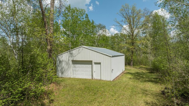 16504 280th St, Park Rapids, MN 56470 - view of outbuilding featuring an outdoor structure and a view of trees
