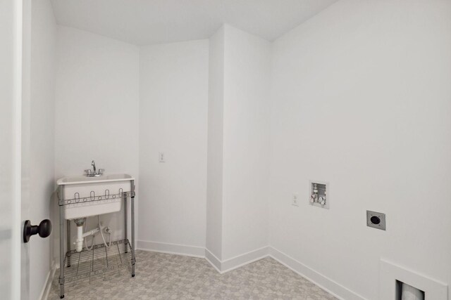 11781 34th St N, Lake Elmo, MN 55042 - washroom with hookup for an electric dryer, hookup for a washing machine, baseboards, and tile patterned floors