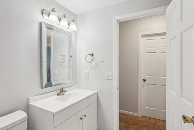1650 132nd Ave NW, Coon Rapids, MN 55448 - bathroom featuring vanity and toilet