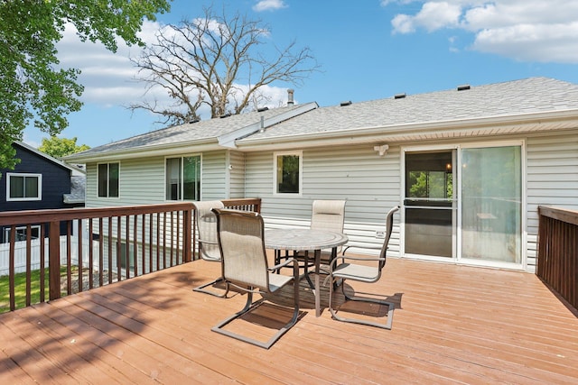 1650 132nd Ave NW, Coon Rapids, MN 55448 - wooden terrace with outdoor dining space