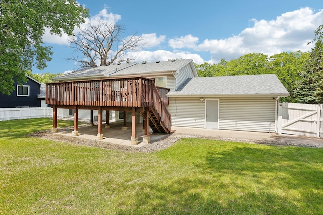 1650 132nd Ave NW, Coon Rapids, MN 55448 - rear view of house featuring stairs, a wooden deck, a shingled roof, a gate, and a patio area