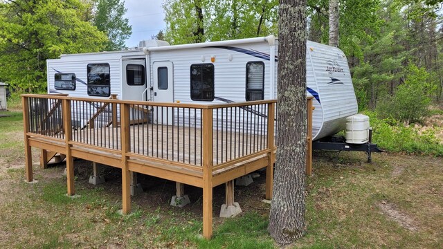 1101 Big Portage Lake Dr NW, Backus, MN 56435 - back of property with a wooden deck