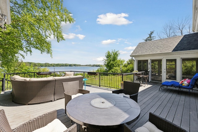 6185 Partridge Ct, Lino Lakes, MN 55110 - wooden deck featuring a water view, outdoor dining area, and an outdoor hangout area