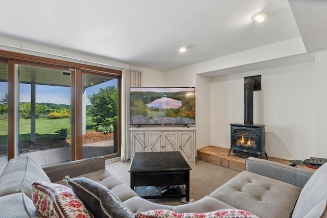 6185 Partridge Ct, Lino Lakes, MN 55110 - living room with carpet flooring and a wood stove