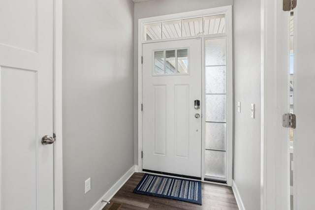 18378 Grasshopper Dr, Lakeville, MN 55044 - foyer with baseboards and dark wood-style floors