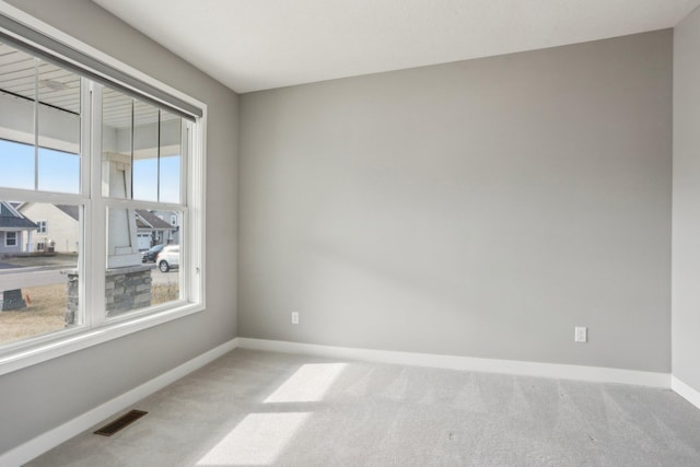 18378 Grasshopper Dr, Lakeville, MN 55044 - spare room featuring carpet and baseboards
