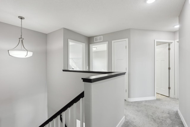 18378 Grasshopper Dr, Lakeville, MN 55044 - hall with an upstairs landing, light colored carpet, and baseboards