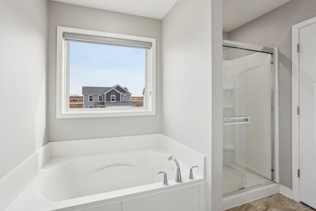 18378 Grasshopper Dr, Lakeville, MN 55044 - full bath with a shower stall and a garden tub