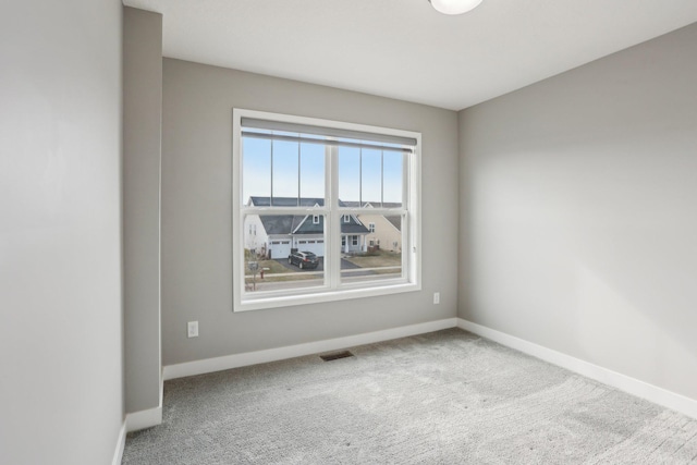 18378 Grasshopper Dr, Lakeville, MN 55044 - unfurnished room with baseboards and carpet floors