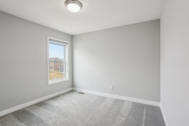 18378 Grasshopper Dr, Lakeville, MN 55044 - unfurnished room featuring baseboards and carpet