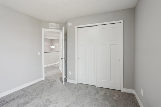 18378 Grasshopper Dr, Lakeville, MN 55044 - unfurnished bedroom featuring carpet flooring, baseboards, and a closet
