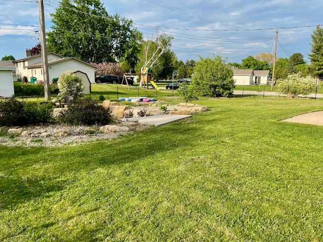 729 10th St E, Wabasha, MN 55981 - view of grassy yard with a playground