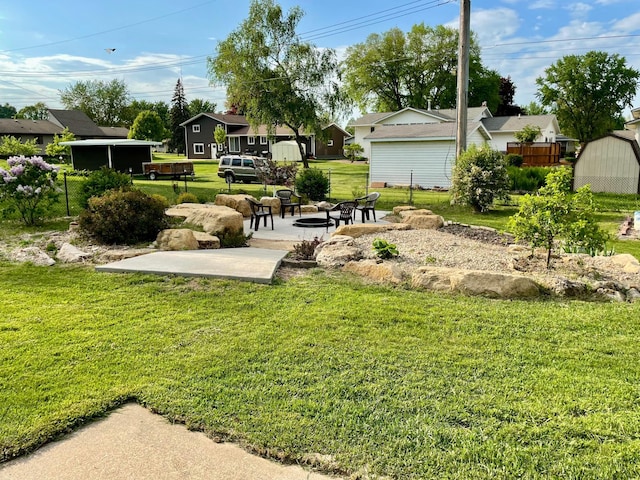 729 10th St E, Wabasha, MN 55981 - view of yard featuring a patio area and a residential view