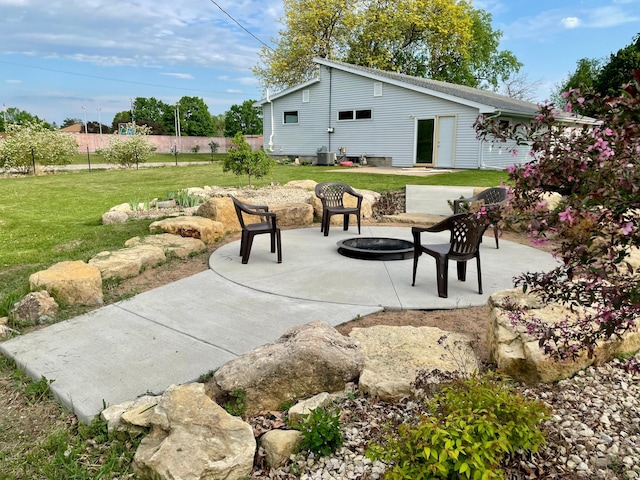 729 10th St E, Wabasha, MN 55981 - view of patio / terrace with an outdoor fire pit and central AC unit